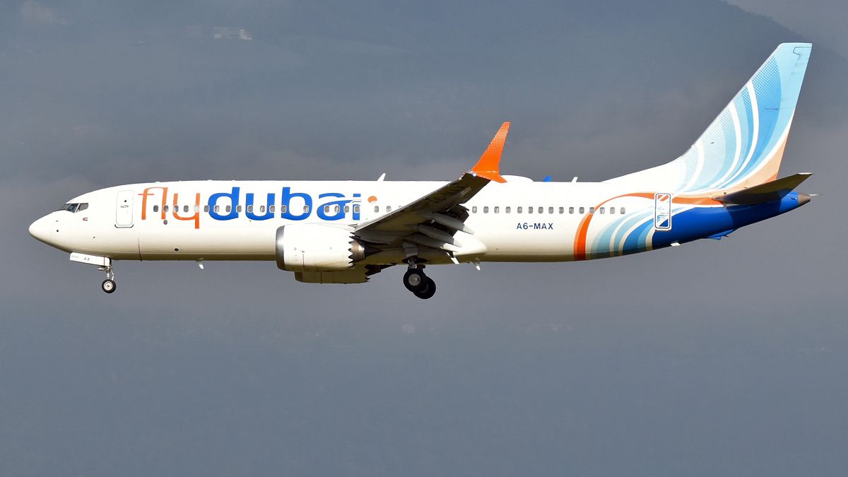 A Flydubai Boeing 737-8 MAX in flight against a grey sky — file photo of registration A6-MAX from 2021, not the aircraft involved